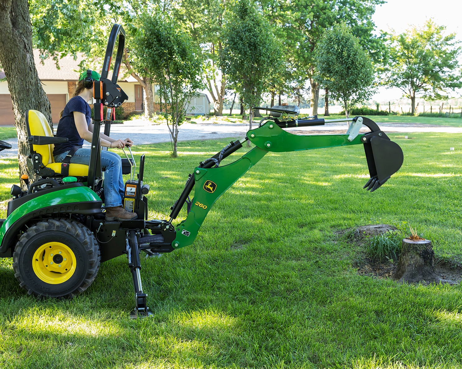 Image of Walk-behind lawn tractor with loader